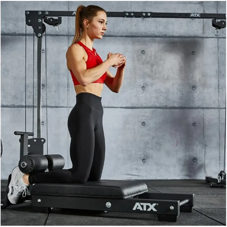 Glute Ham Trainer au sol ATX ultra compact pour entraînement du bas du corp en home gym
