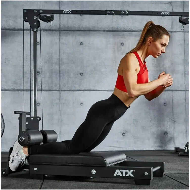 Glute Ham Trainer au sol ATX ultra compact pour entraînement du bas du corp en home gym