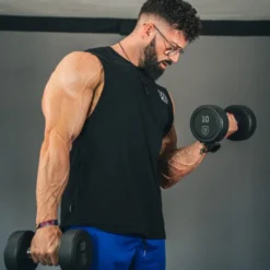 Haltères ronds monoblocs en caoutchouc de 2,5 à 40 kg Titanium Strength avec poignées en acier chromé
