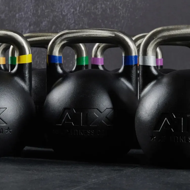Kettlebells de compétition ATX de 8 à 48 kg avec code couleur et poignée de précision 34 mm