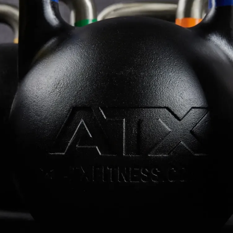 Kettlebells de compétition ATX de 8 à 48 kg avec code couleur et poignée de précision 34 mm