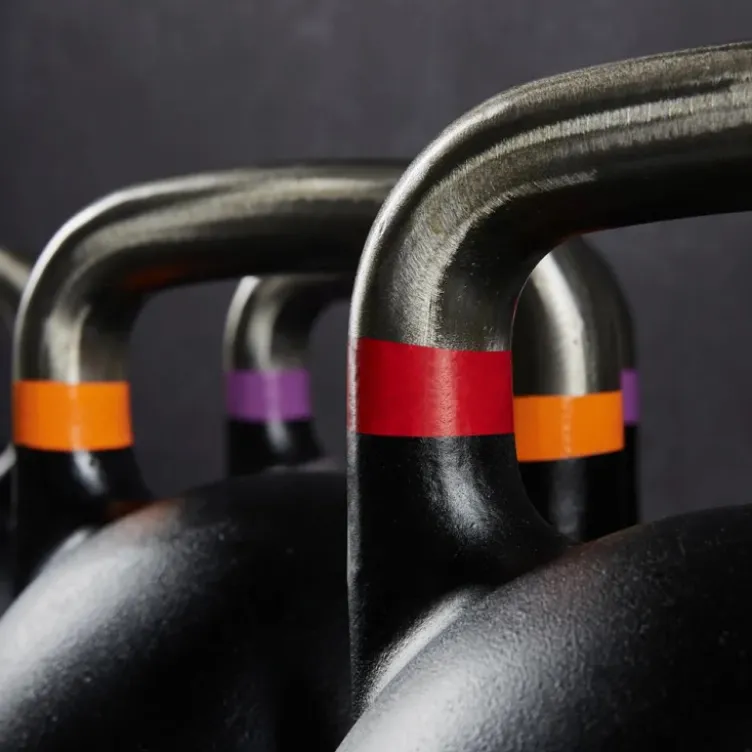 Kettlebells de compétition ATX de 8 à 48 kg avec code couleur et poignée de précision 34 mm