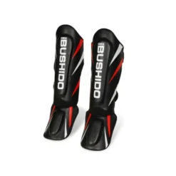 Protèges-tibias et pieds de combat en cuir