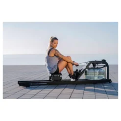 Rameur à eau avec système de recul actif pour trainings en homegym - Roues de transport