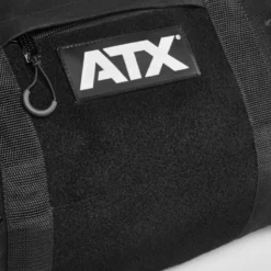 Sac de sport et de voyage d'une volume de 40 à 42 L avec compartiment à chaussures et bandoulière amovible