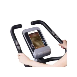 Vélo d'appartement pour training en homegym avec support pour téléphone portable