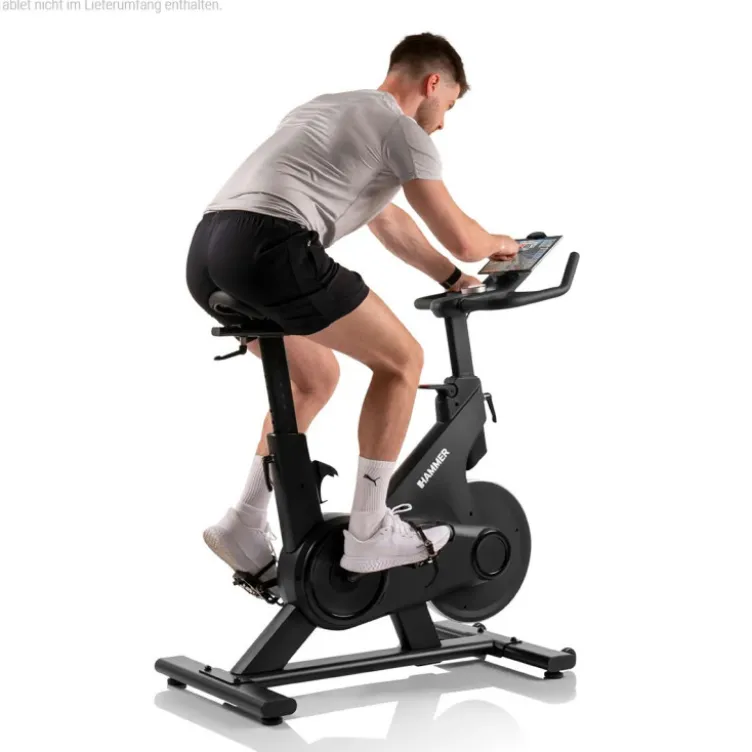 Vélo spinning de cardio Speed Race X avec roue d'inertie de 20 kg - 32 niveaux de résistance et écran HD