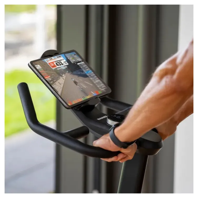 Vélo spinning de cardio Speed Race X avec roue d'inertie de 20 kg - 32 niveaux de résistance et écran HD