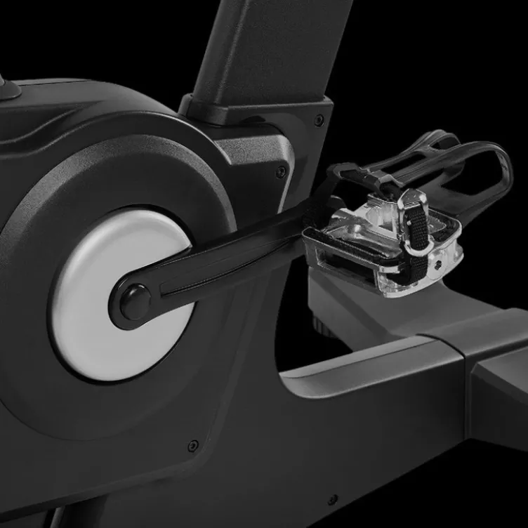 Vélo spinning professionnel Racemachine ATX avec volant d'inertie de 18 kg et écran multifonction pour séances intensives