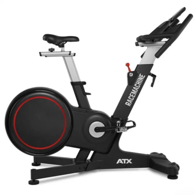 Vélo spinning professionnel Racemachine ATX avec volant d'inertie de 18 kg et écran multifonction pour séances intensives
