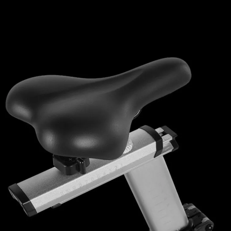 Vélo spinning professionnel Racemachine ATX avec volant d'inertie de 18 kg et écran multifonction pour séances intensives