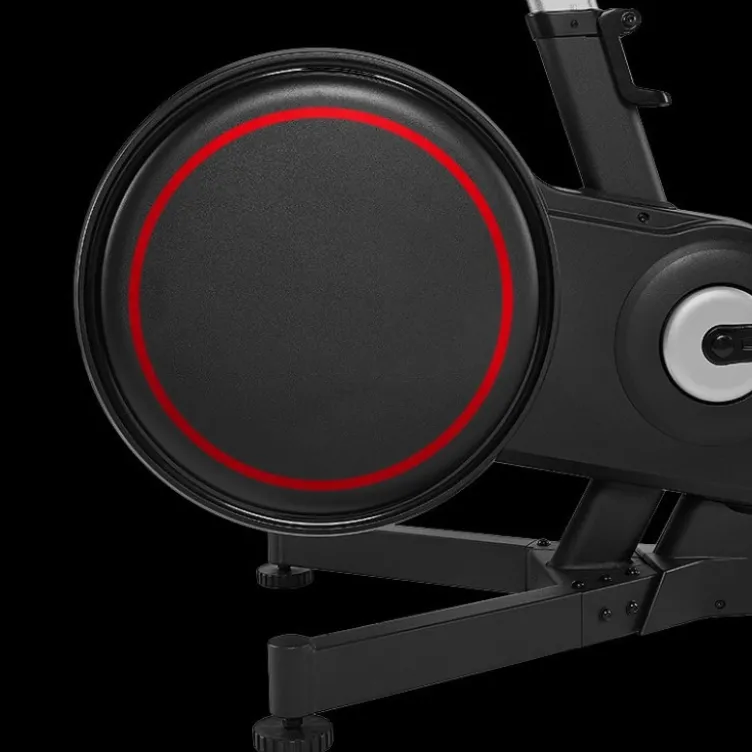 Vélo spinning professionnel Racemachine ATX avec volant d'inertie de 18 kg et écran multifonction pour séances intensives