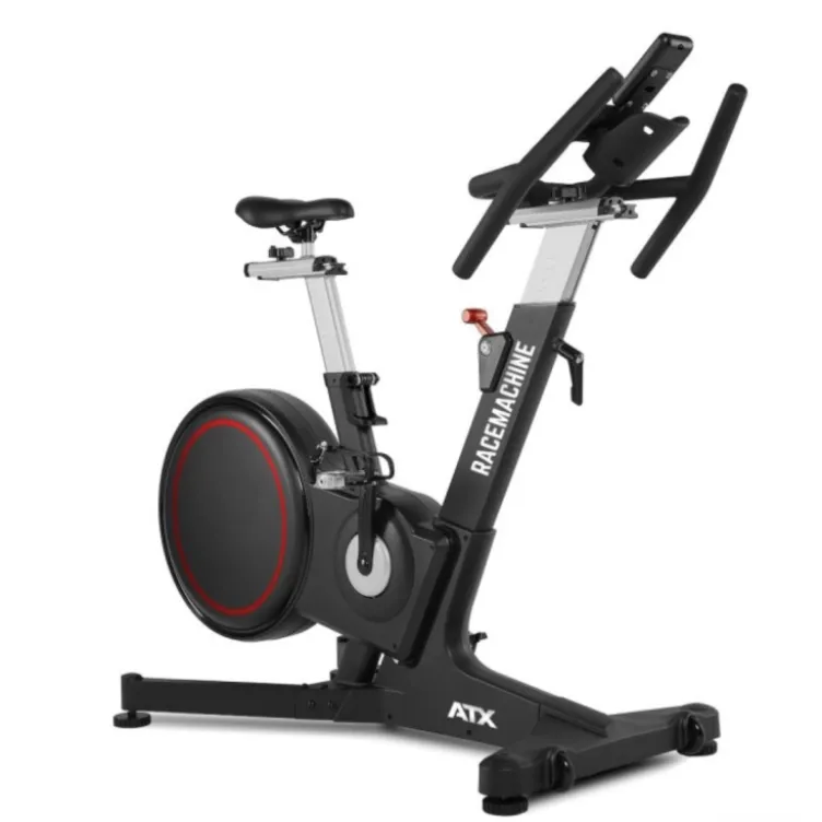 Vélo spinning professionnel Racemachine ATX avec volant d'inertie de 18 kg et écran multifonction pour séances intensives